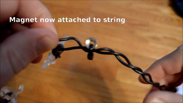 magnet on string